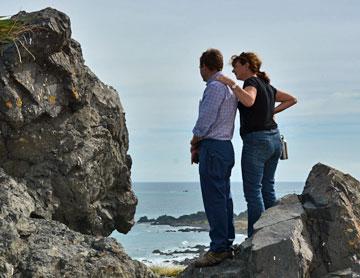 An Ausise couple enjoying the view from the lighthouse platform