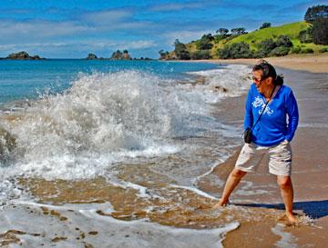 Enjoying the beach at Tauranga Bay