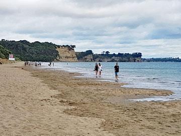 Strolling along the beach at Long Bay on Auckland's North Shore
