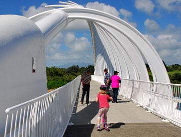 The Te Rewa Rewa bridge with Mount Taranaki hiding behind cloud