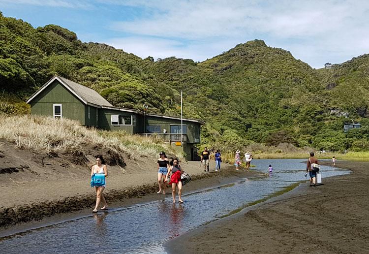 Walking down the river past the surf club