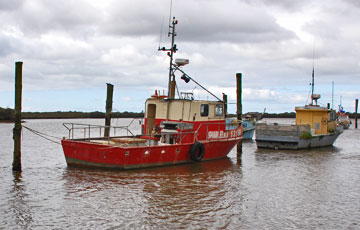 Fishing boats moored at Utahi Bay