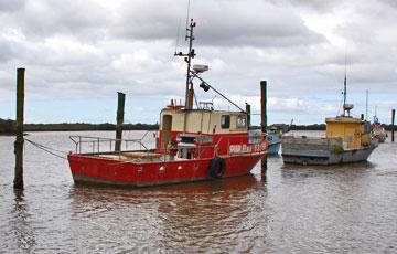 Fishing boats moored at Utahi Bay