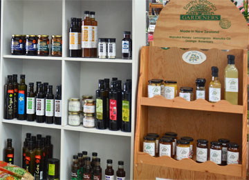 Selection of olive oil and honey in the garden centre