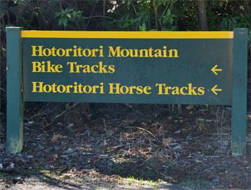 Sign pointing to the mountain bike and horse tracks
