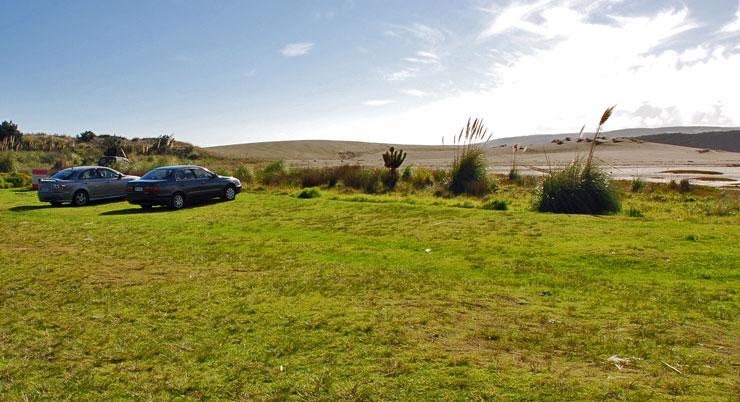 Grassed parking area at Port Waikato Reserve