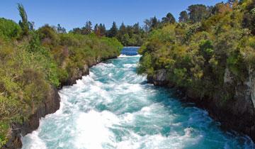 The turbulent river feeding the falls
