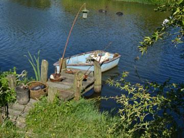 Boat tied up by the Mill