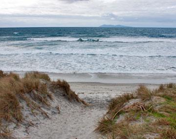 The ocean beach on blustery winter afternoon