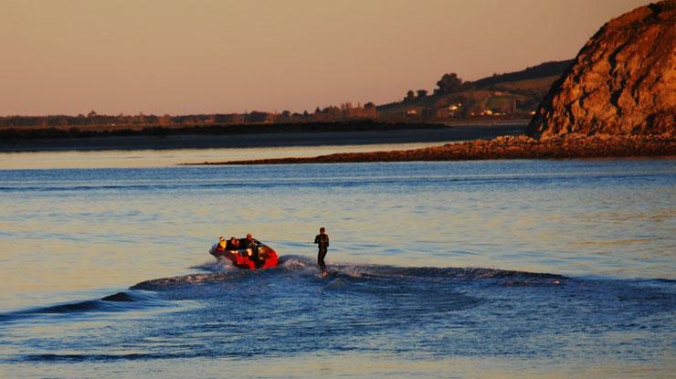 Waterskiing at sunset