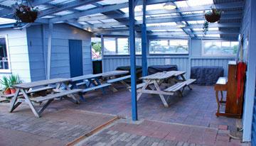 Covered dining area with piano