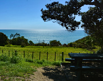 Parking with a picnic table and a sea view