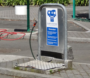 Public dump station with fresh water