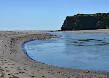 The river emptying into the Tasman Sea