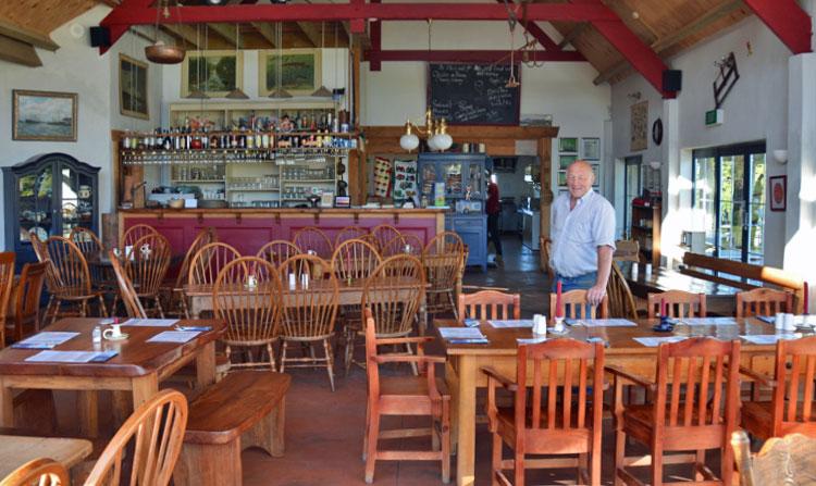 Joep, the owner inside the restaurant