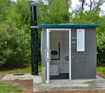 Clean long-drop public toilet