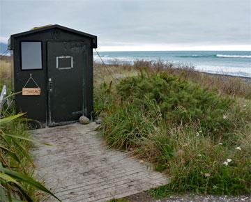 Public toilet at the far end of the beach