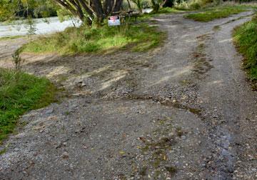 Washed out gravel driveway