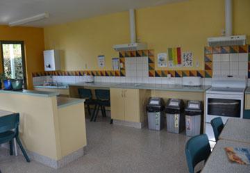 Spotless kitchen edged with tiles