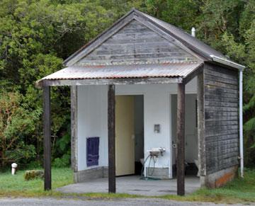 Outside toilet in the parking area