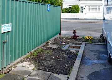 Public dump station with potable drinking water