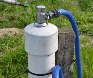 push-button operated fresh water tap