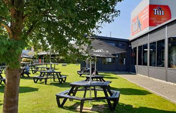 Picnic tables in the brewery grounds