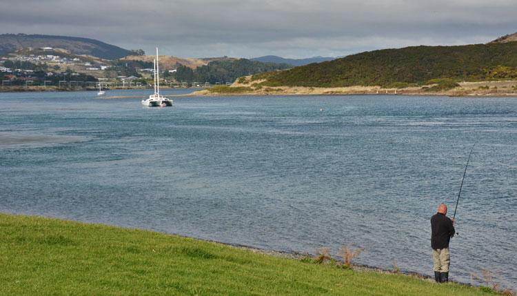 Fishing along the harbour edge