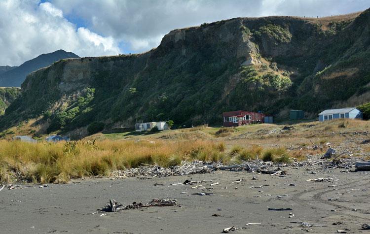 Holiday homes at the base of the cliff