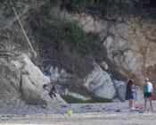 Boy swinging on a rope