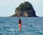 Lady rafting on surfboard