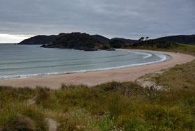 Golden sand beach at Matai Bay